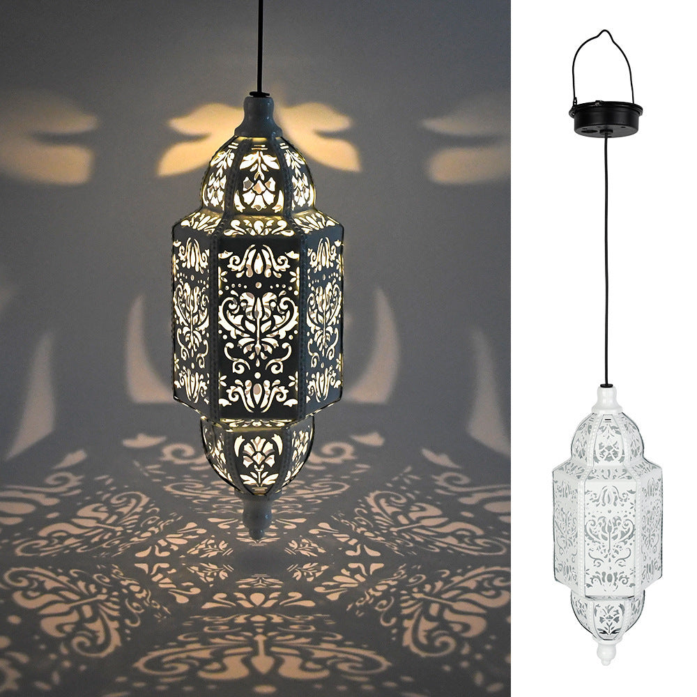 Lampe de projection solaire en fer ajouré