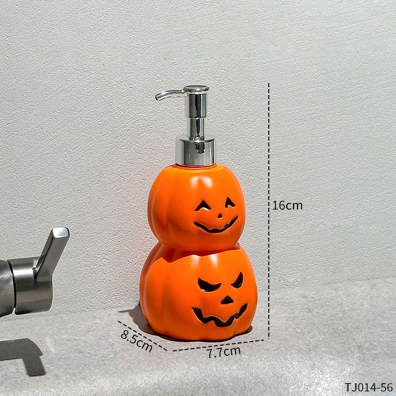 Fles in de vorm van een pompoen met een spookgezicht