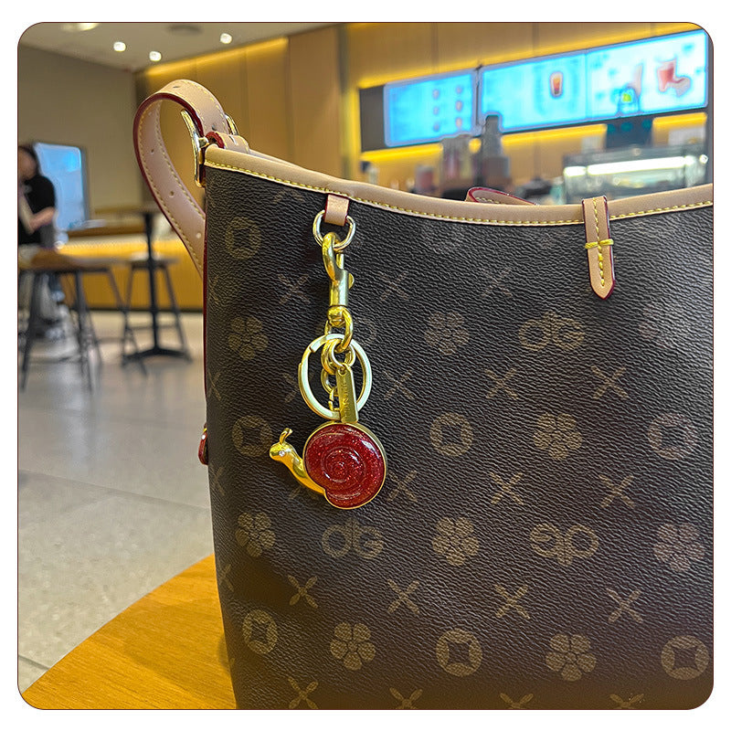 Porte-clés escargot pour sacs à main femme, accessoire élégant pour clés de voiture, cadeau parfait pour la Saint-Valentin