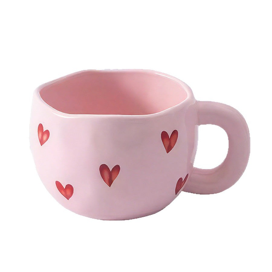 Ceramic cup with red heart and handle