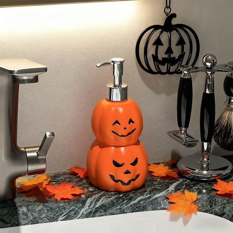 Fles in de vorm van een pompoen met een spookgezicht