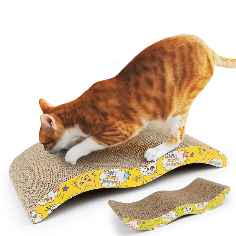 An orange and white cat scratching a corrugated cardboard scratcher.